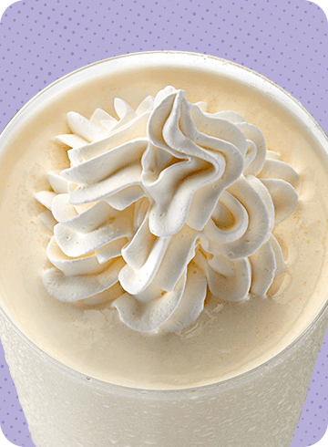 vanilla milkshake on a purple background