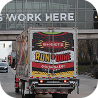 sheetz truck driving to a donation event