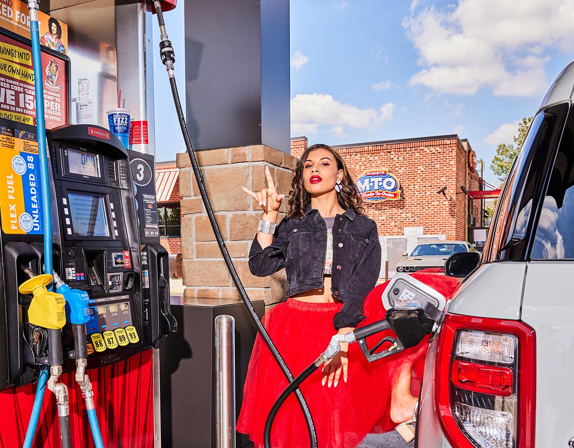woman pumping gas